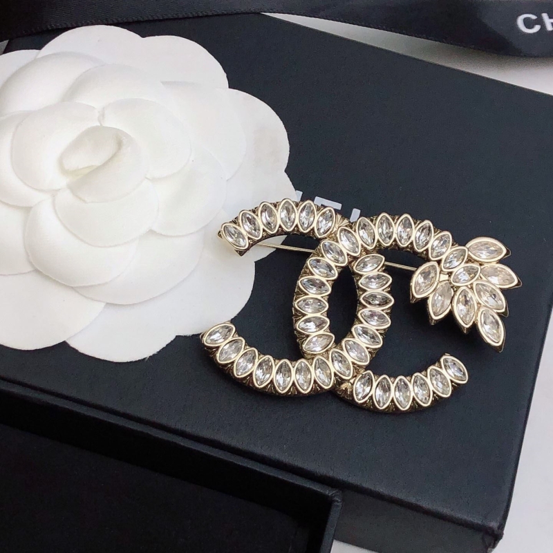 Ch**el brooches